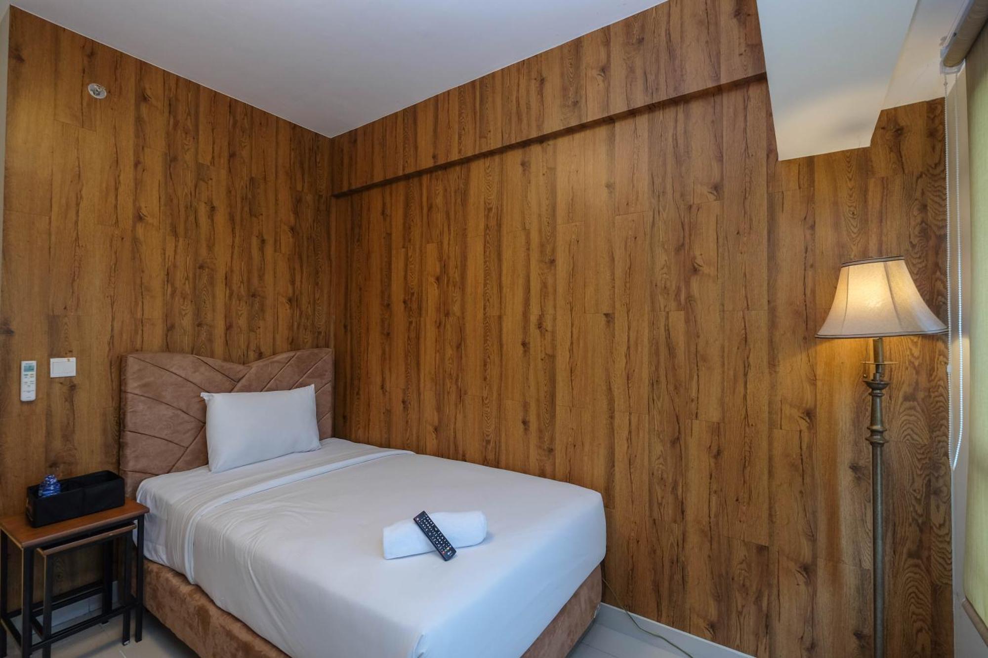 Apartemen Cozy And Strategic At Springlake Summarecon By Travelio